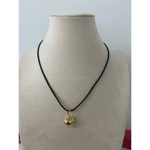 Gold tone puffed heart necklace
